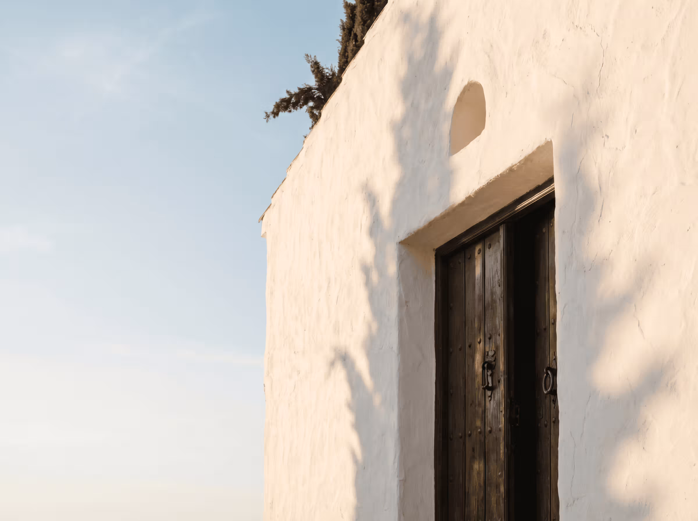 Whitewashed Spanish facade and door — property registry clarity for owners in Spain